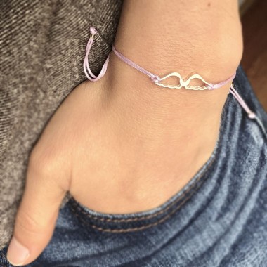 Pulsera Alas en plata con frase
